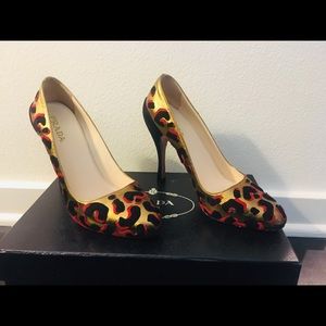 Gold, red and black Prada shoes. Size 37.
